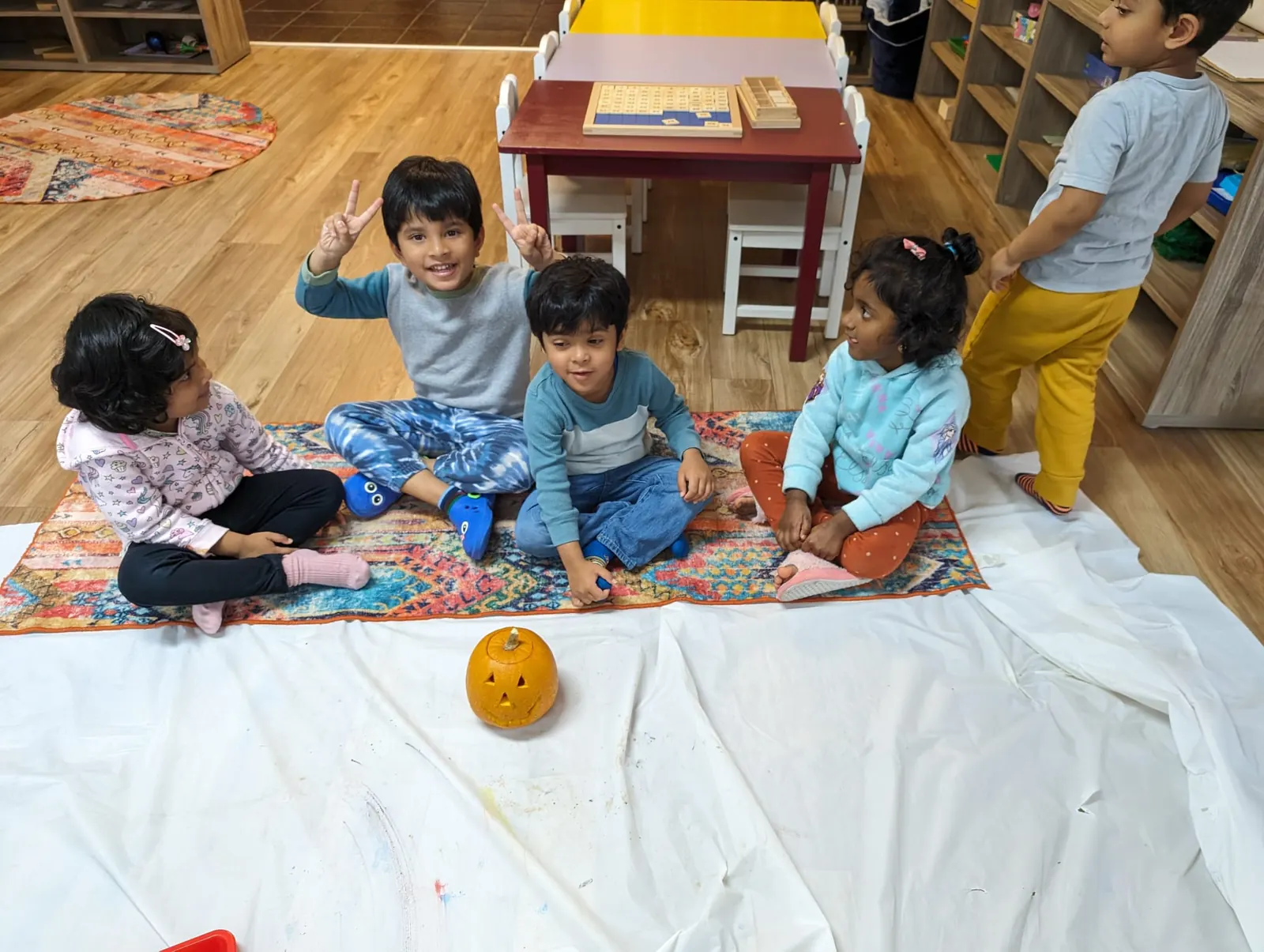 Children sitting together during an art activity