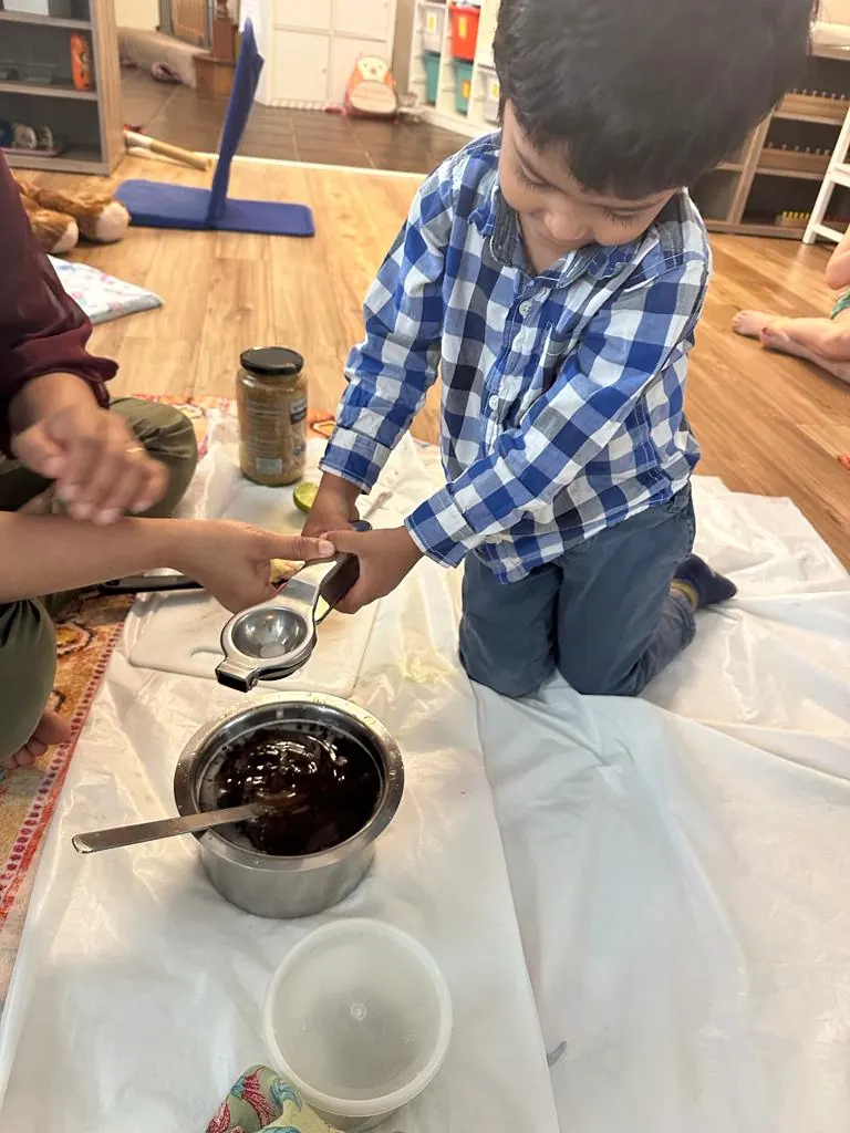A child making jaggery juice