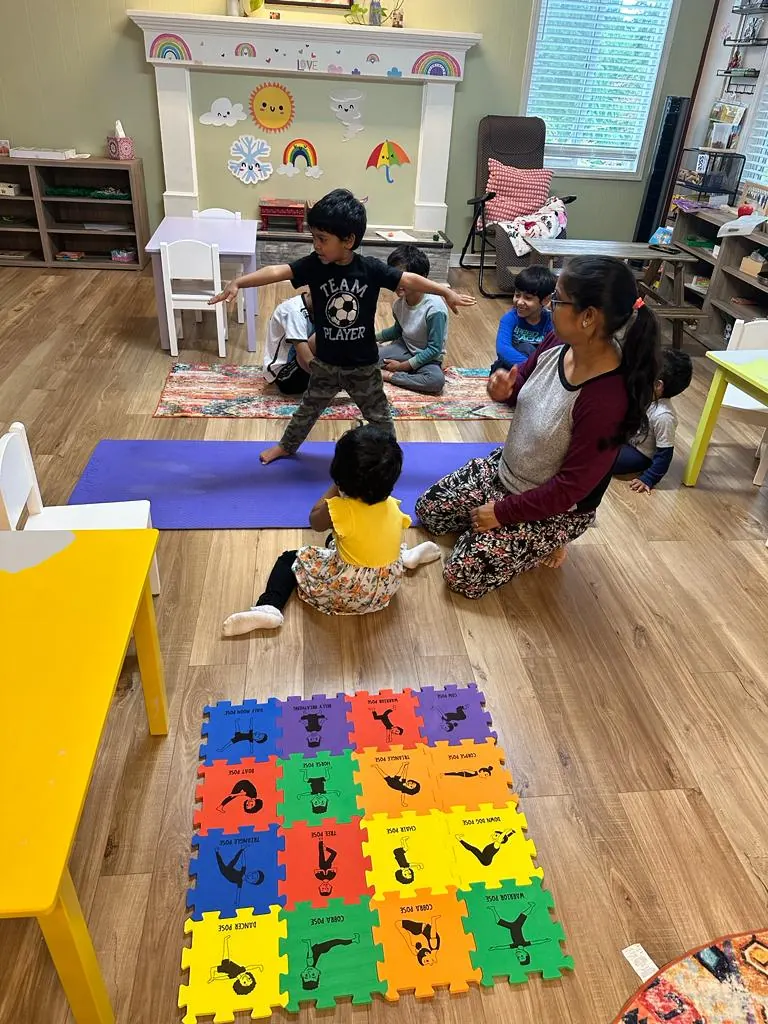 Children doing yoga on colourful mats