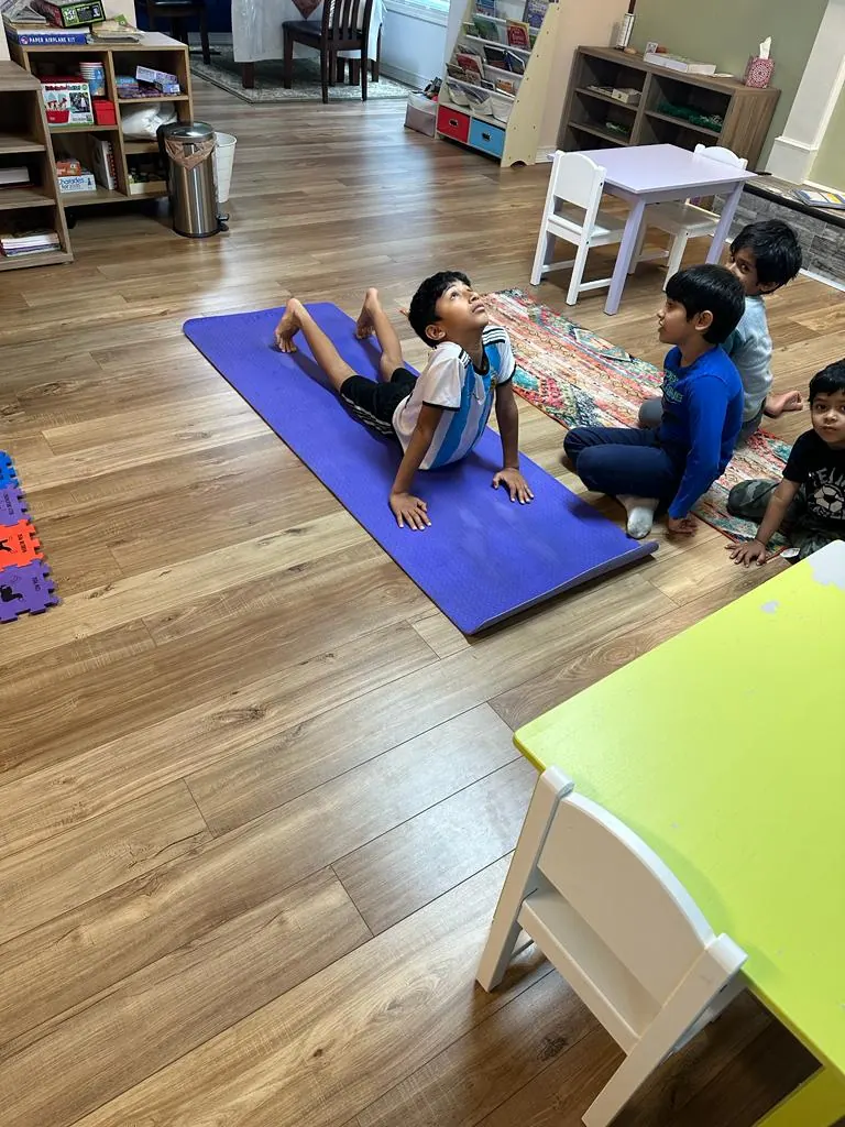 Children stretching on yoga mats